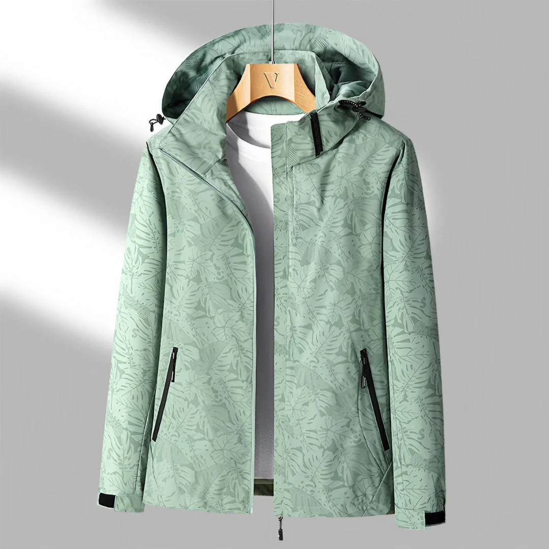 "Veste imperméable Opaline pour femme, légère et coupe-vent, avec capuche intégrée et design moderne."