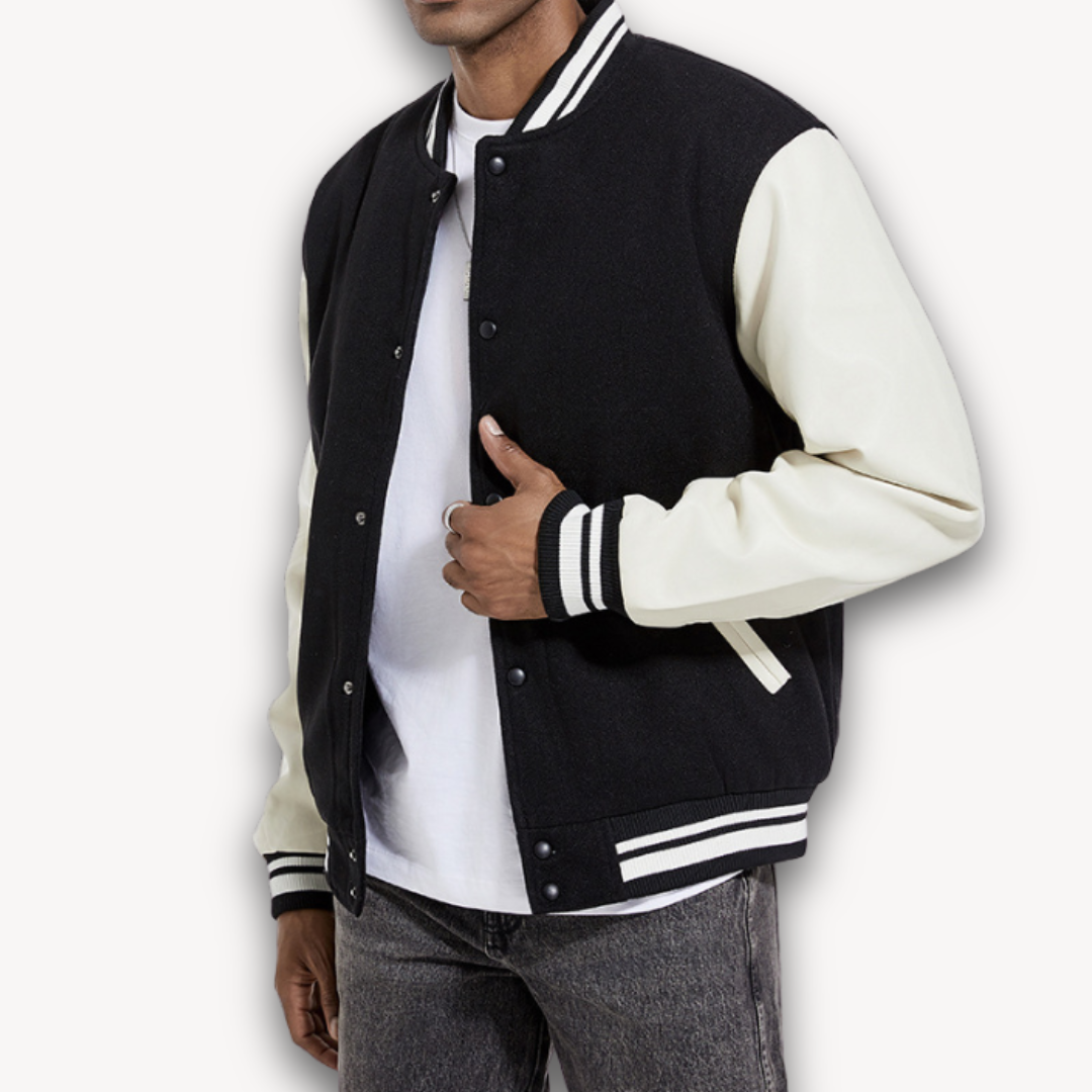 "Veste universitaire homme, manches effet cuir, coupe décontractée, bleu marine, idéale mi-saison, style chic et sportif."